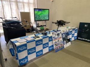 ＡＣＳＬ、陸上自衛隊十条駐屯地にて開催された「ロジスティクス展」に出展し 、物流・災害・警備分野で活用できる国産ドローンを展示